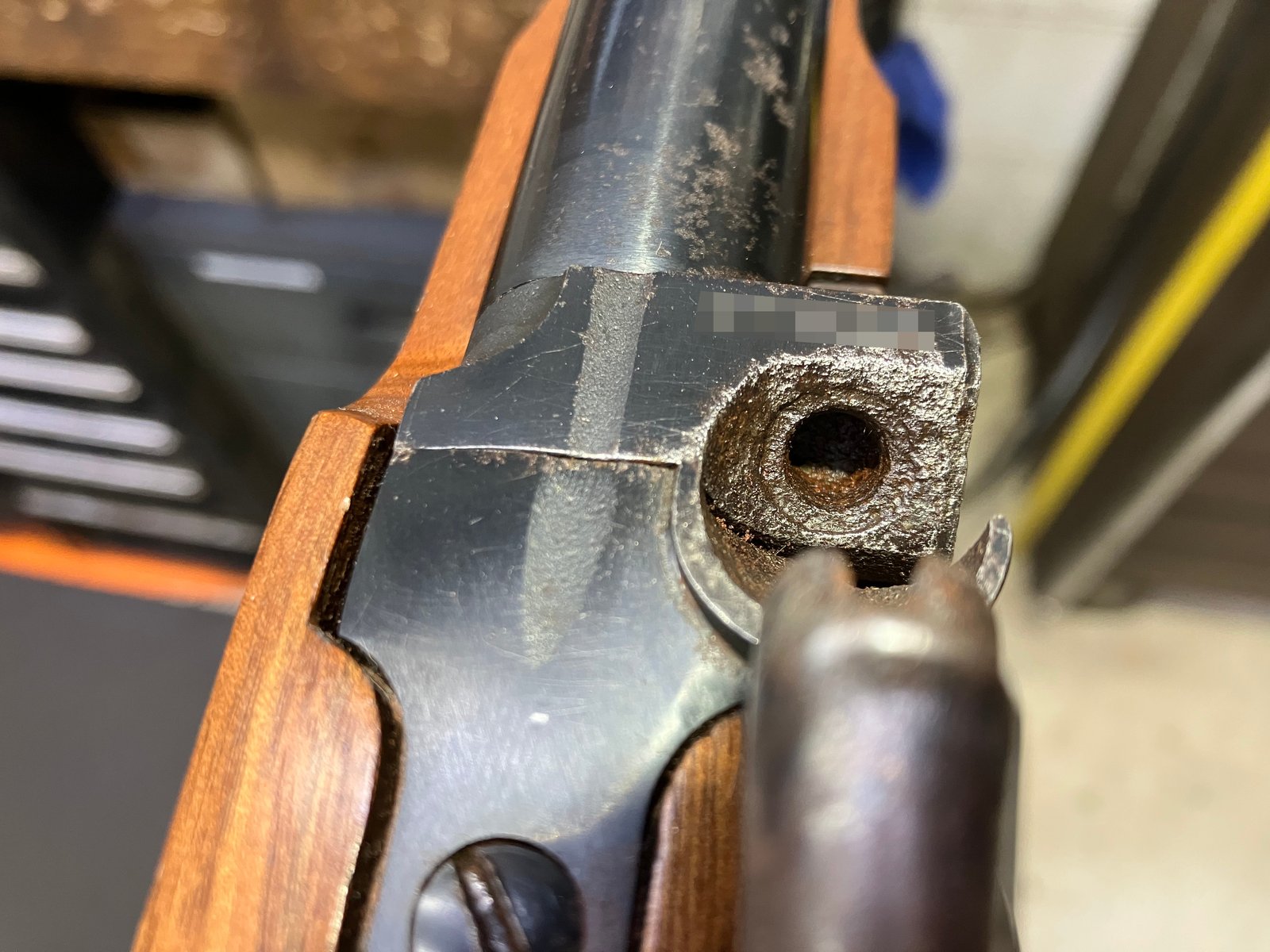 Muzzleloader bolster as received, with the nipple missing and a rusted ignition port
