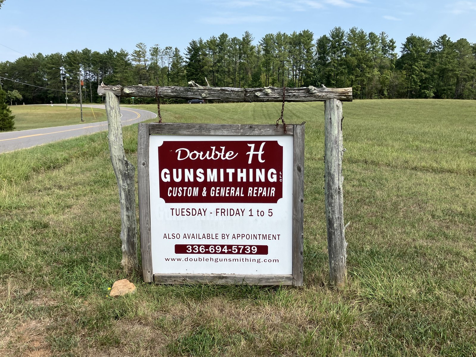 Double H Gunsmithing roadside sign