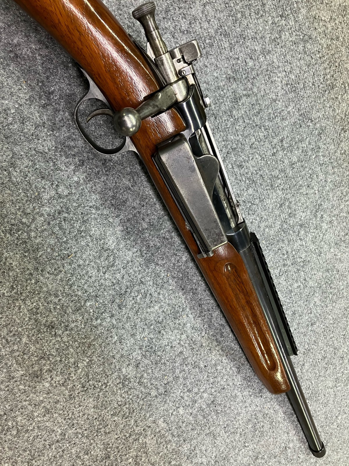 Fuller view of a scout rail installation on a sporterized Krag-Jorgensen with a forward-mounted scope