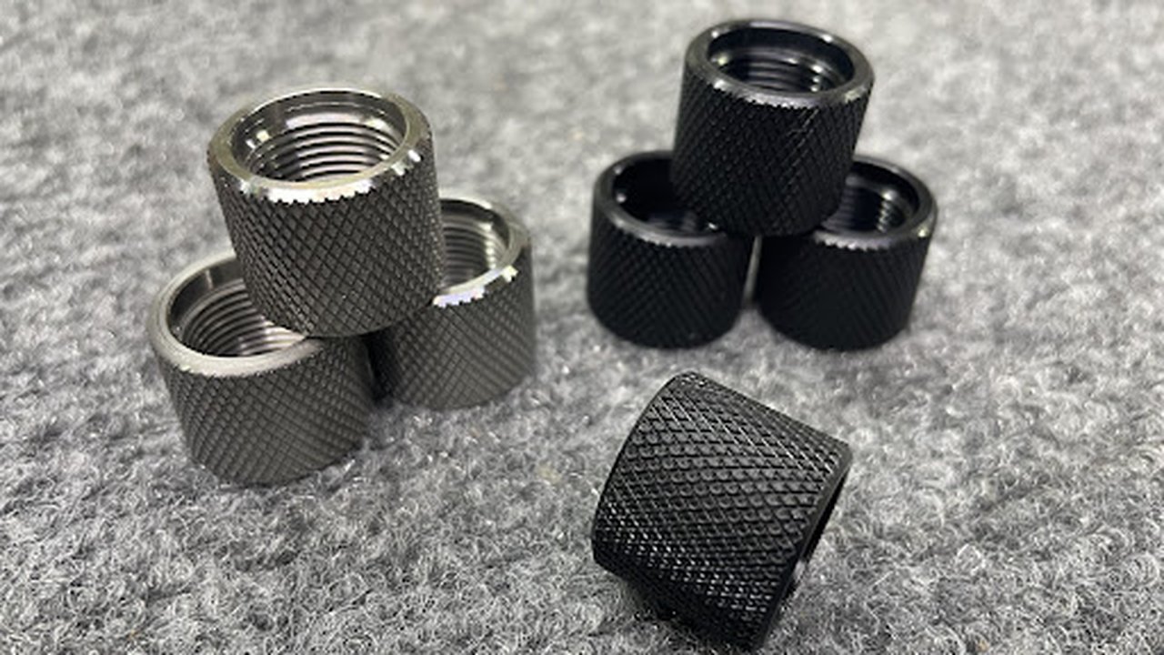 Stack of inexpensive knurled barrel thread protectors
