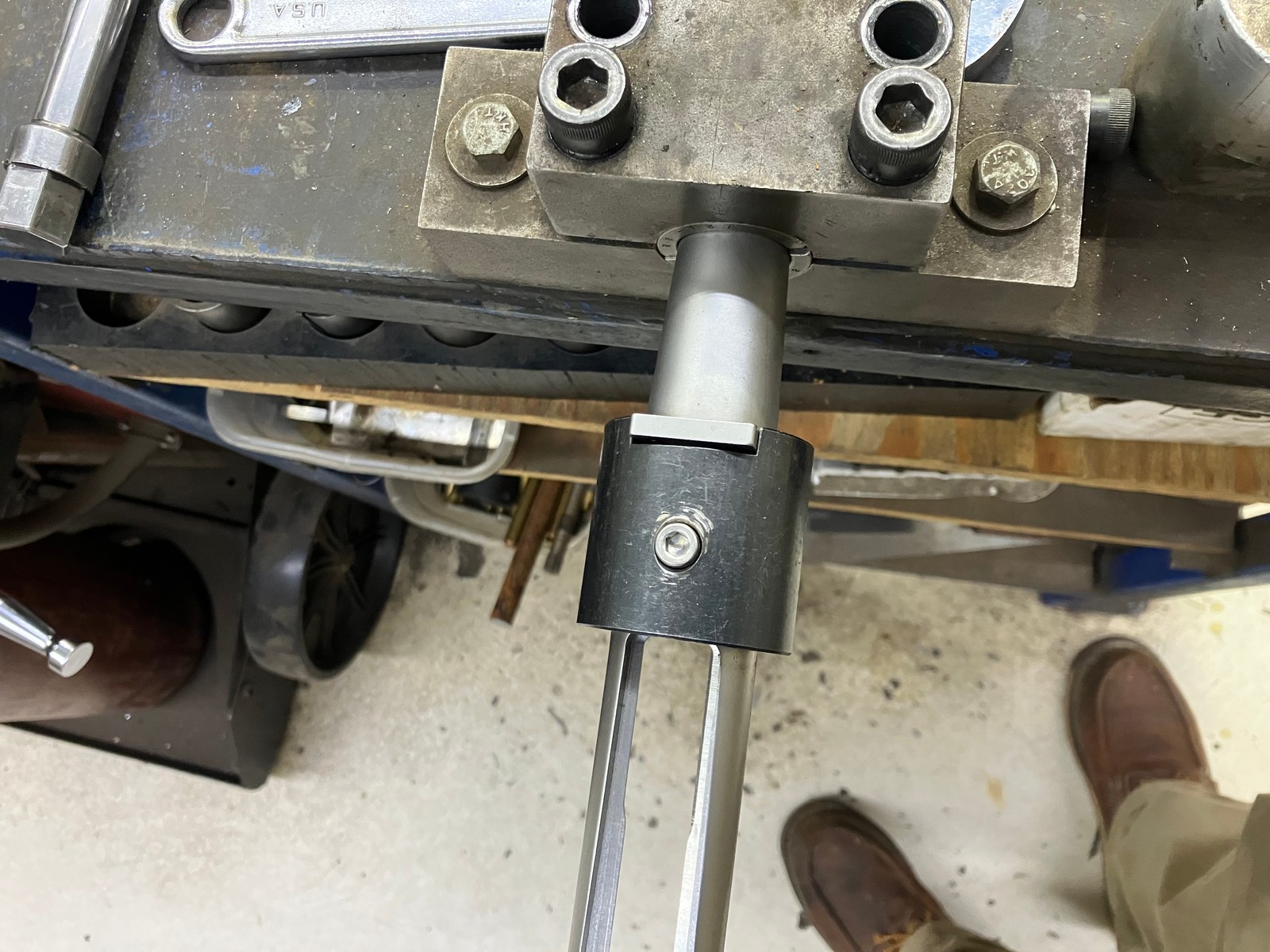 Special tool aligning the recoil lug so the action fits back into the stock